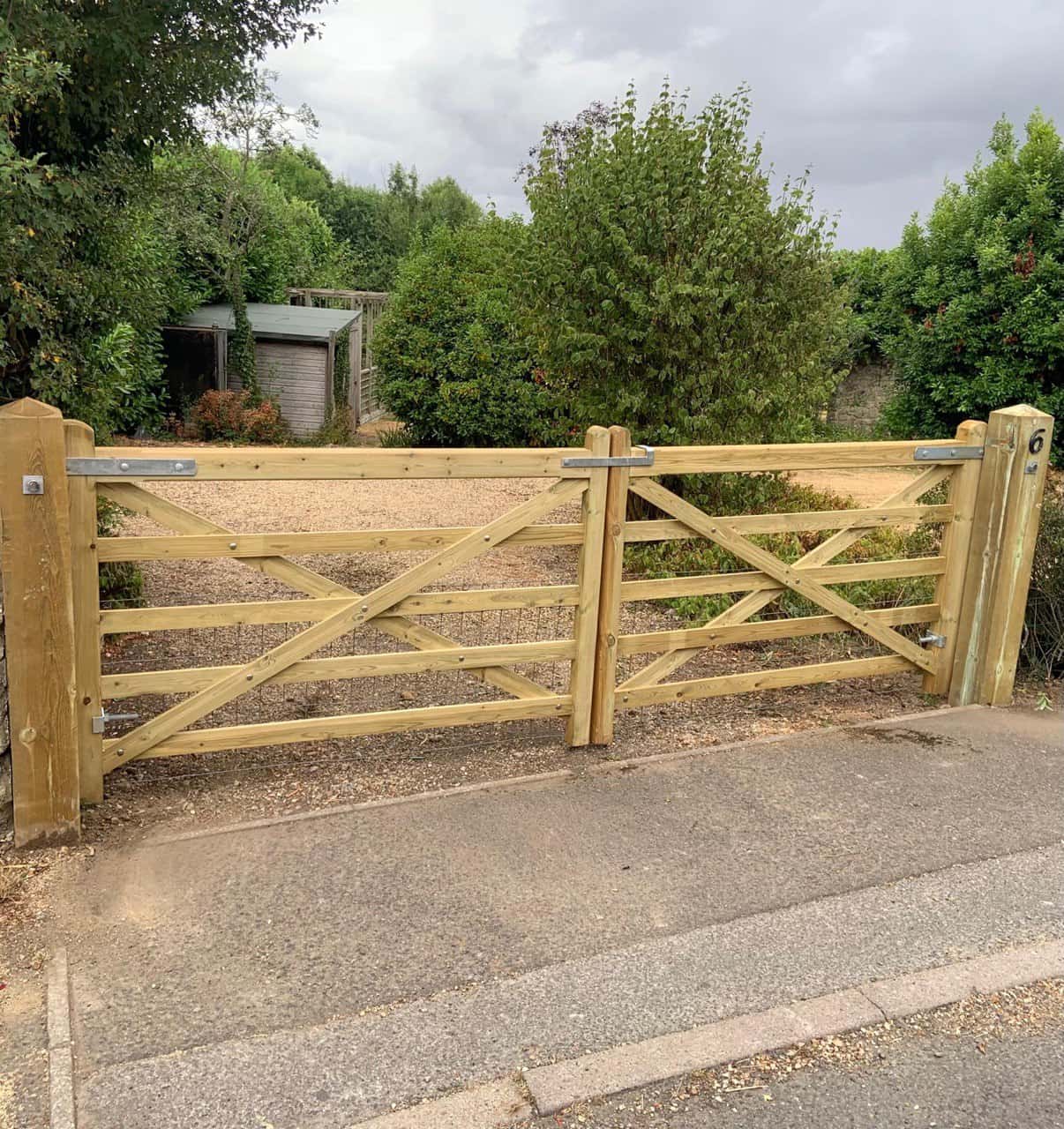 This is a photo of a wooden driveway gate installed by Fast Fix Fencing Edenbridge